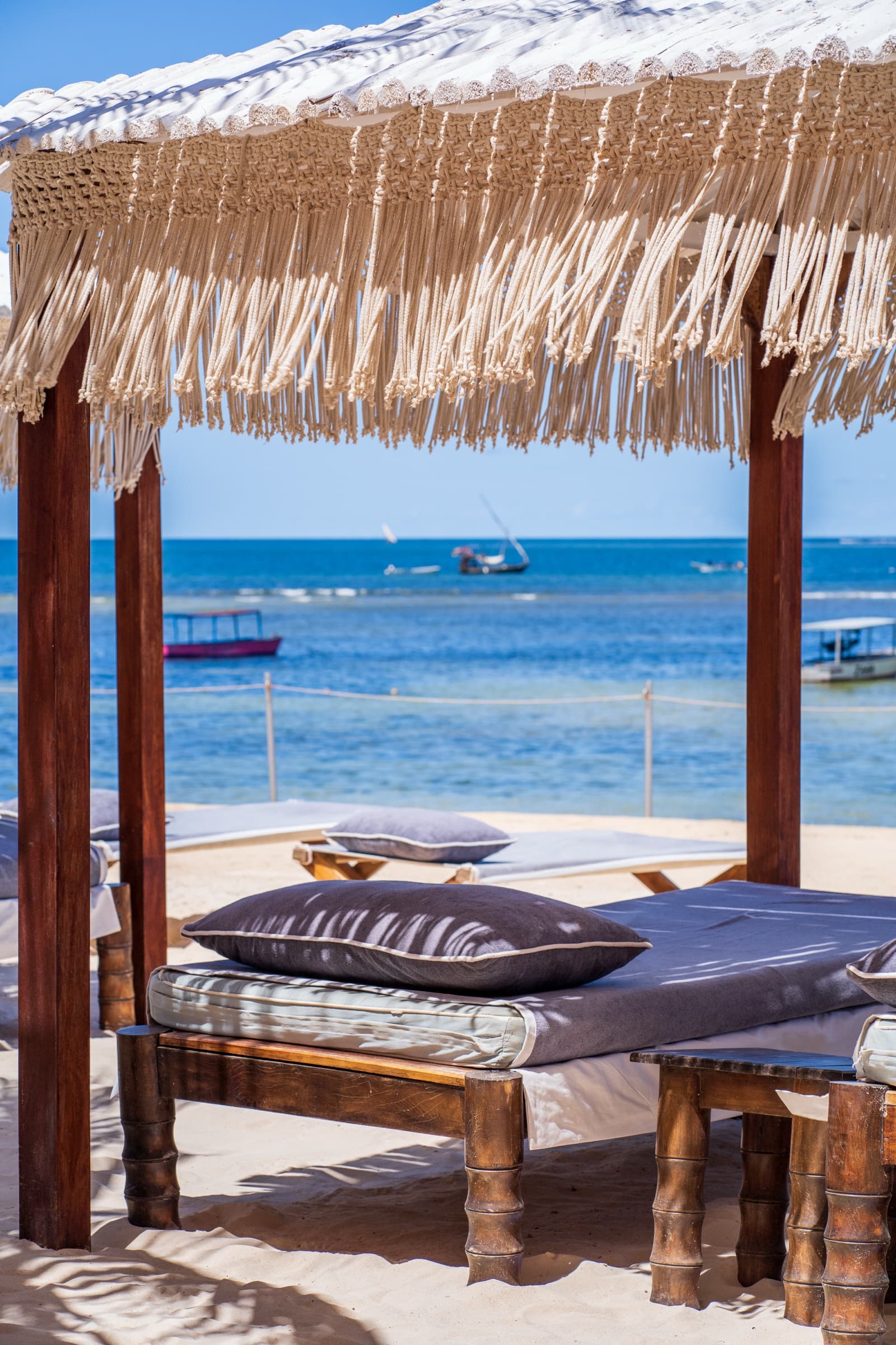 Beachside daybed canopy at Billionaire Resort